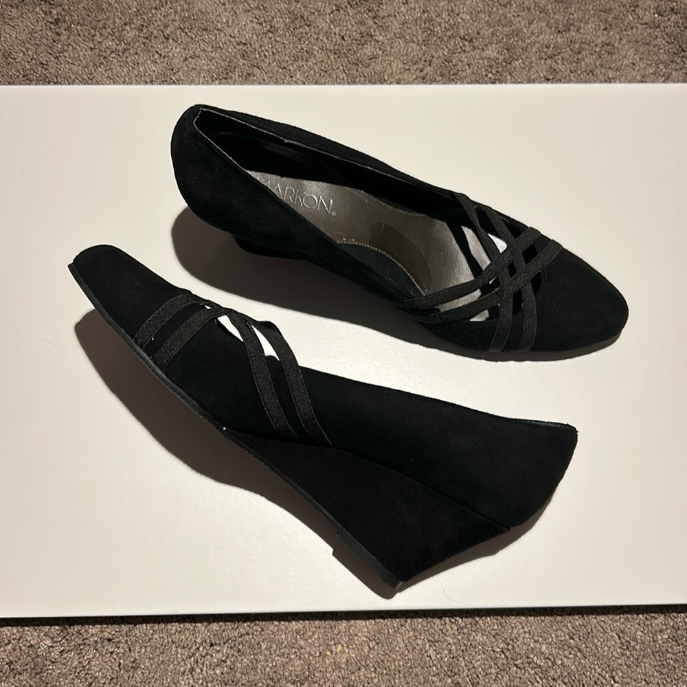 Classy black wedges w/ criss cross accent 1.5’